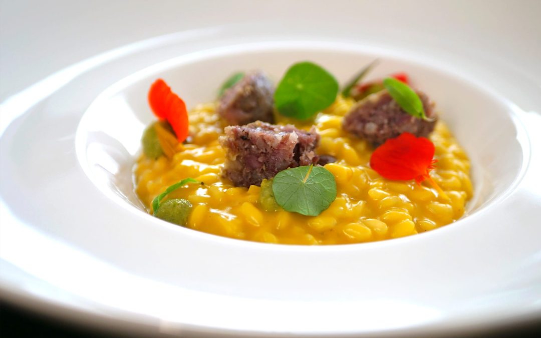 Risotto alla zucca con cotechino e salsa verde